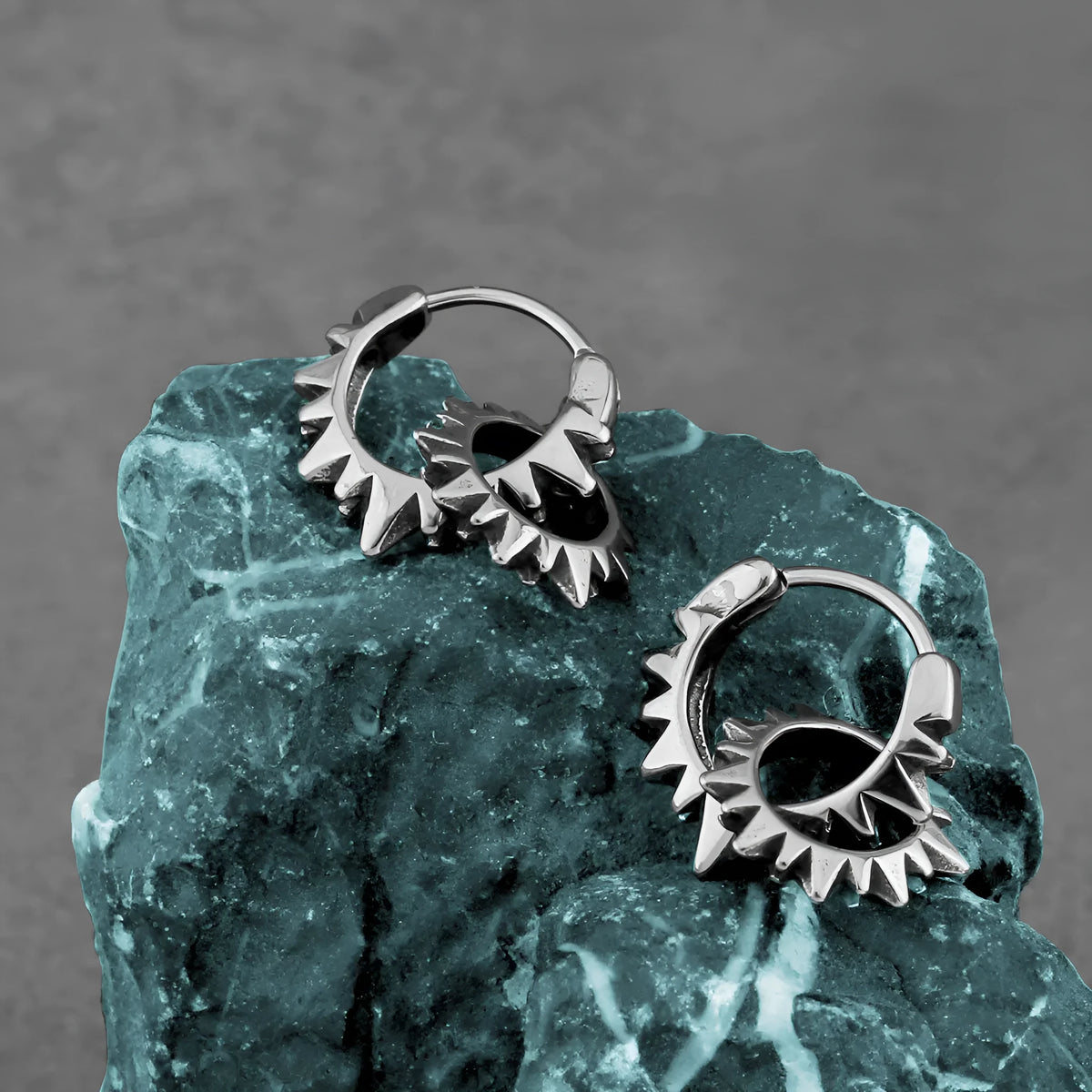 Stainless steel round ring earrings with polished steel finish in retro European style