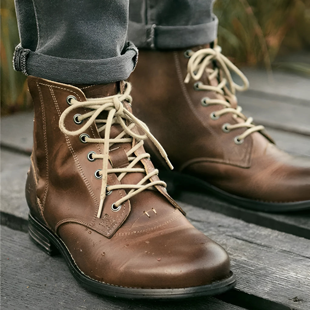 Knight Series brown leather boots with side zipper on a white background