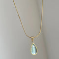 Retro blue and green water drop necklace with titanium steel snake bone chain