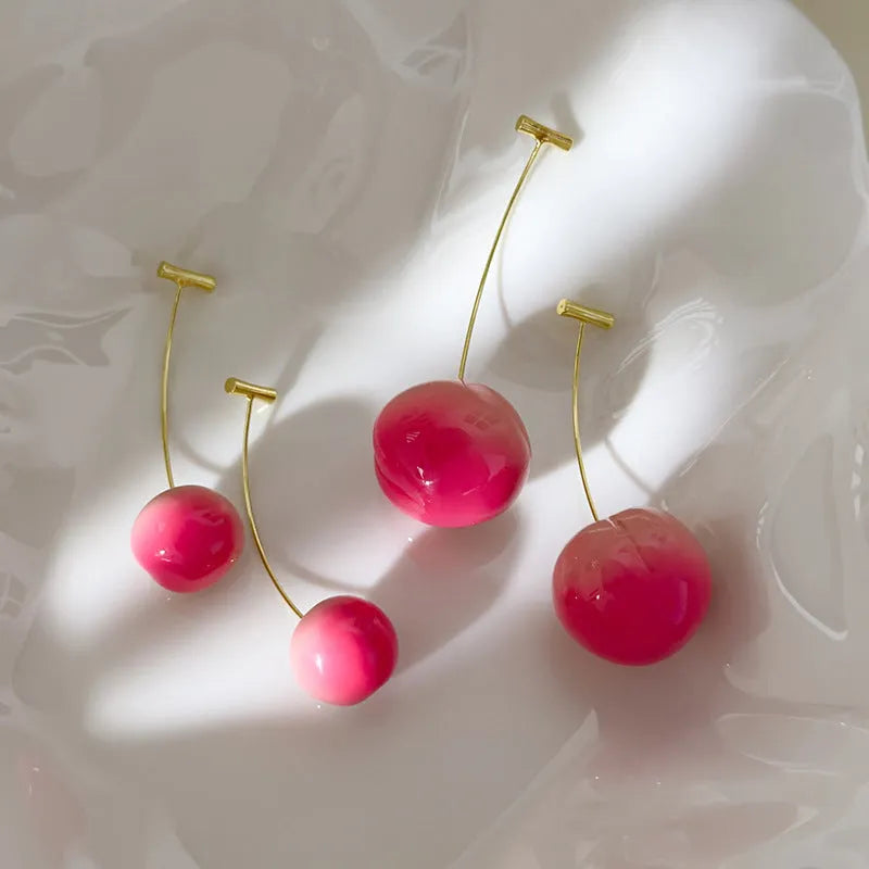 Acrylic peach fruit earrings with gold-tone earwires in small and large size options