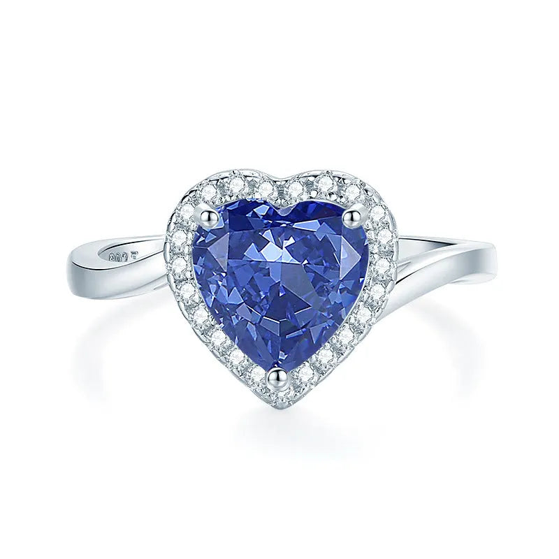 Heart-shaped sterling silver ring with a faceted ice flower cut zircon stone in a Tanzanite colour.