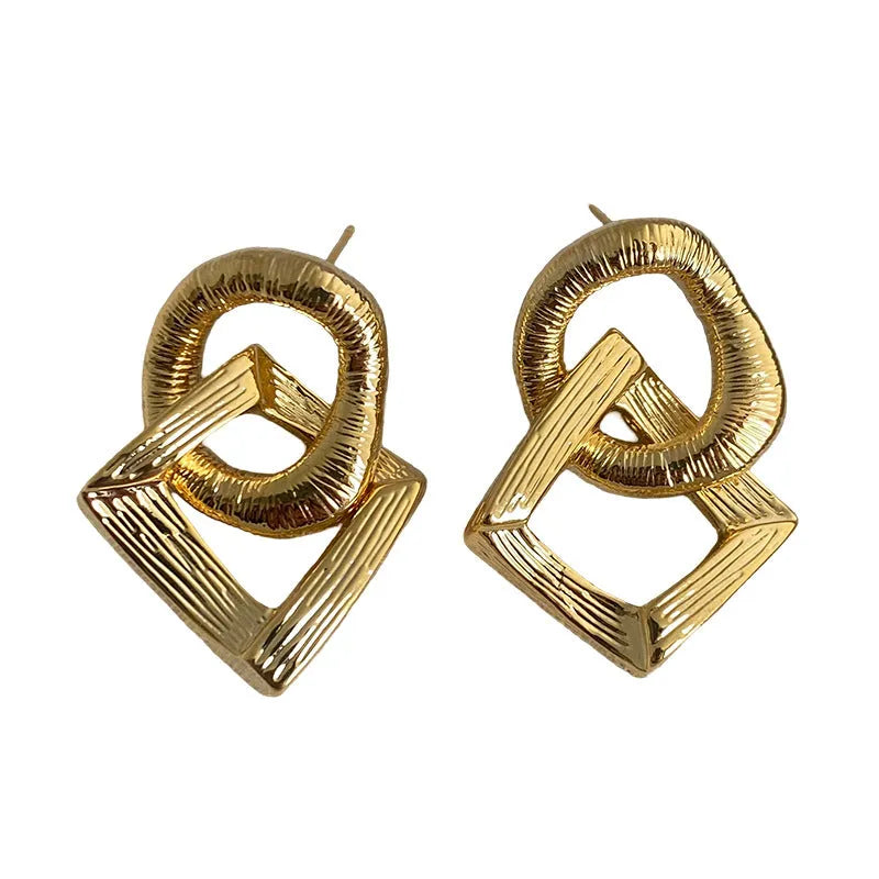 Gold and silver retro geometric copper drop earrings, 3.4cm long.
