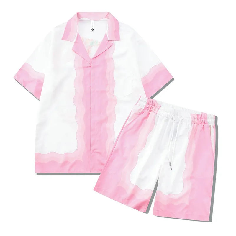 Plaid print beach outfit set for men and women, featuring a short sleeve shirt and matching trousers on a hanger.