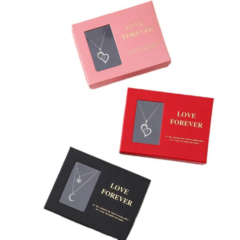 Six scented soap flowers in red pink or black inside a gift box with matching handbag