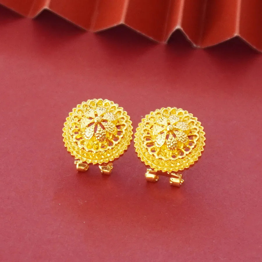 Landscape Middle East gold-plated floral jewellery set showing necklace, earrings and ring with electroplated finish