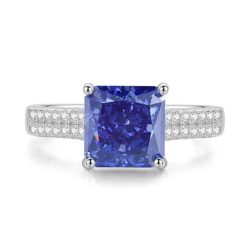 Heart-shaped sterling silver ring with a faceted ice flower cut zircon stone in a Tanzanite colour.