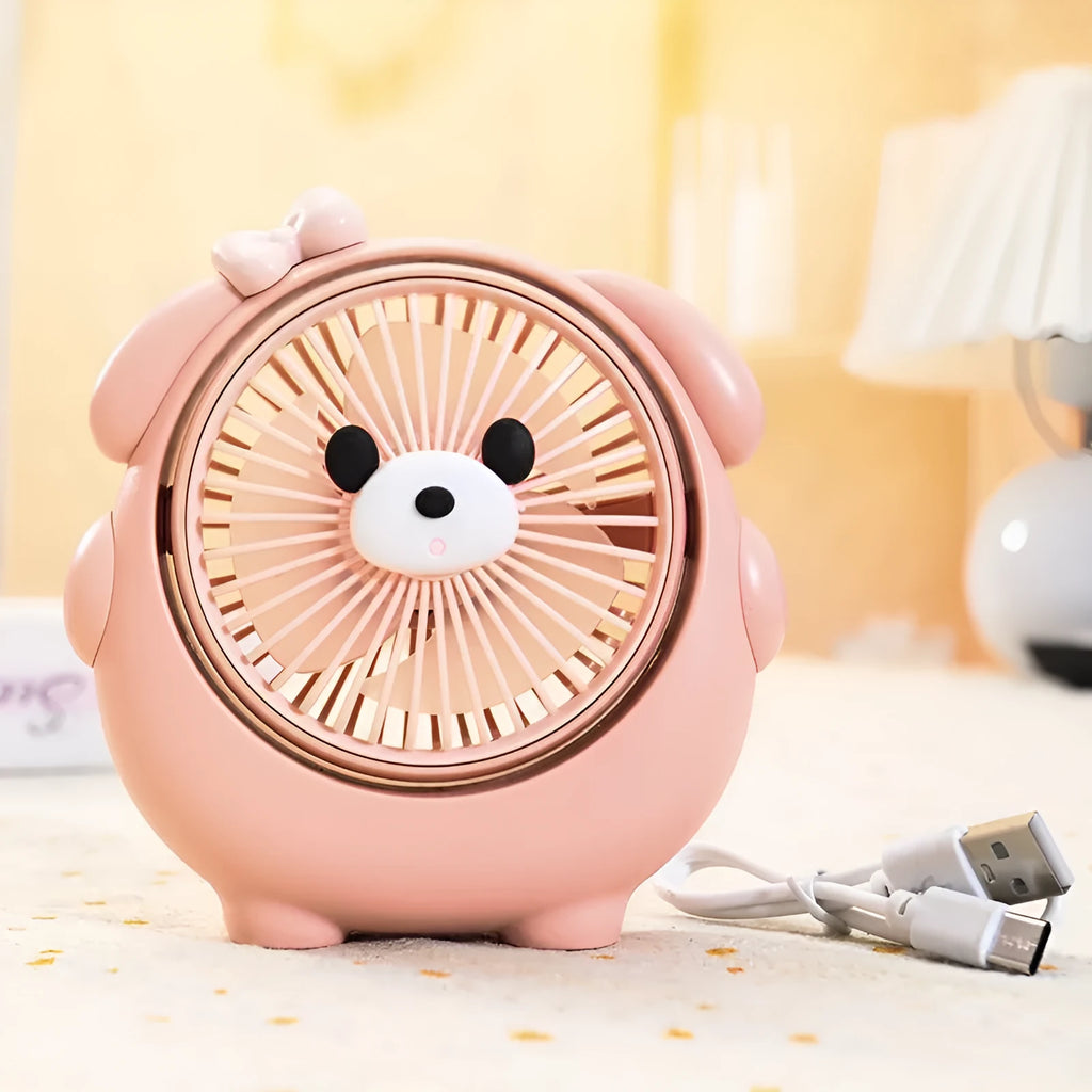 A Bear Brown coloured desktop USB electric fan for dogs on a wooden table.