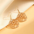 Spiral donut jewellery set showing necklace, bracelet and earrings in gold tone geometric circle design