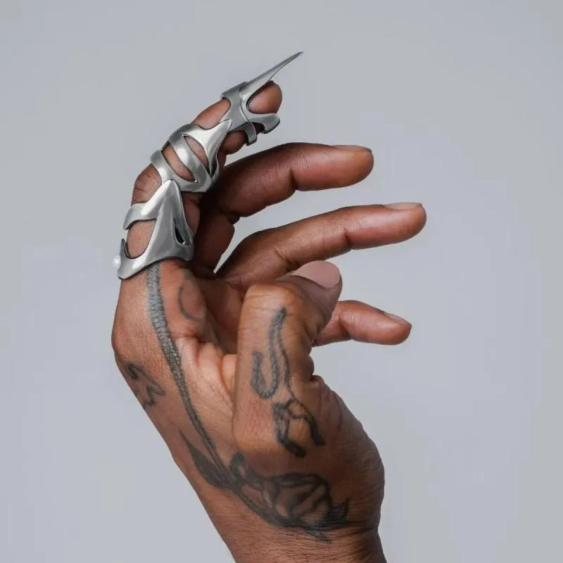 Silver metal alloy finger stall ring for punk armour and gothic fashion accessory