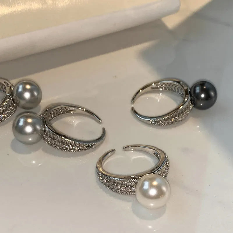 Adjustable copper finger ring with geometric black pearl design, open index construction