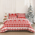 Red Christmas pattern three-piece bedding set with quilt cover and pillowcases on bed