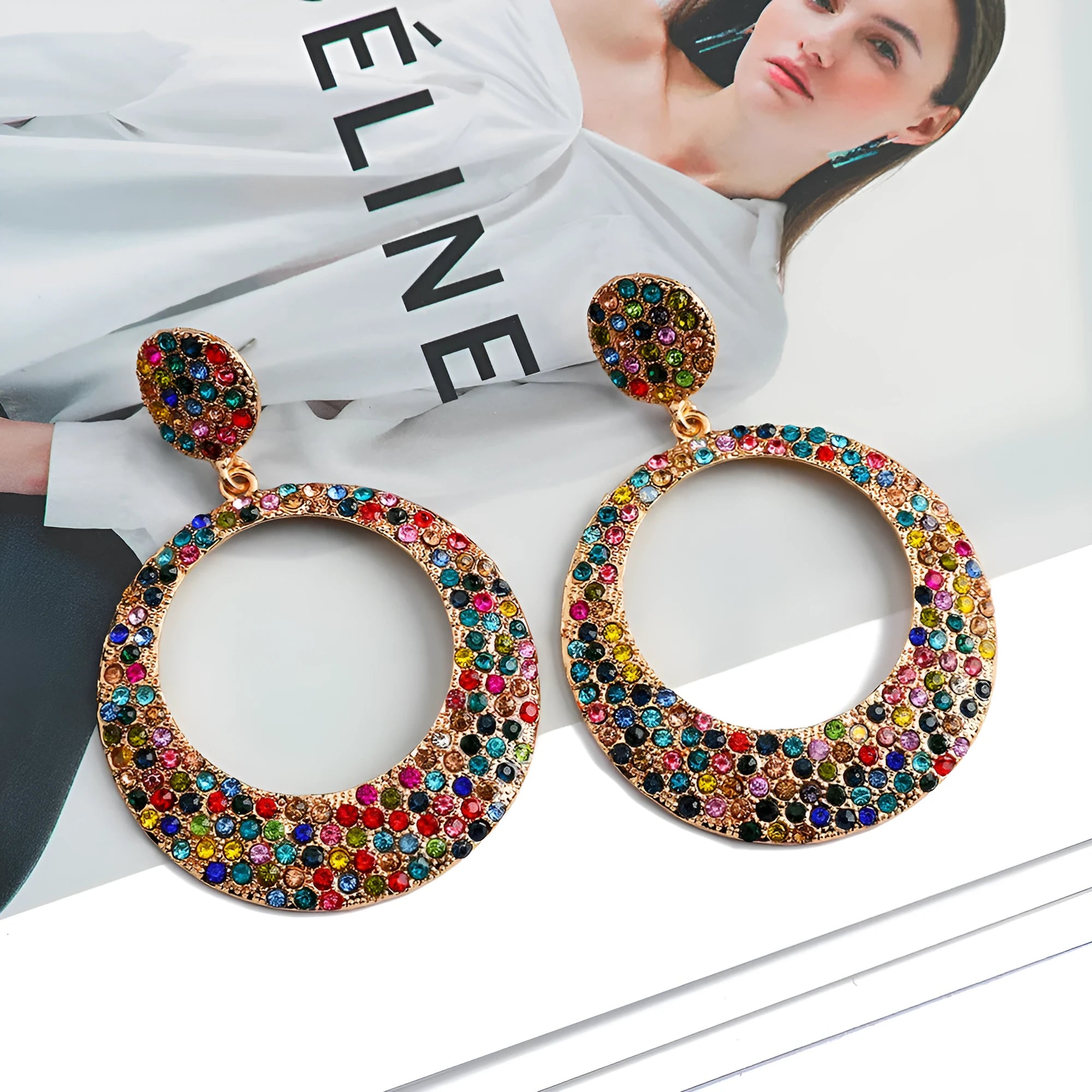 Large round metal alloy pendant earrings with colourful cartoon style design