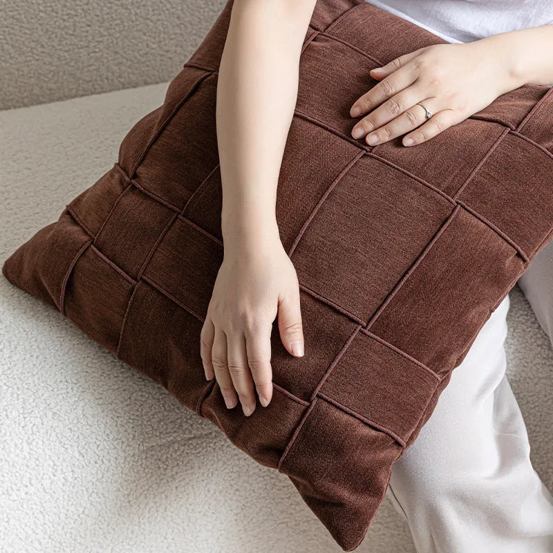 50x50cm square woven chenille pillow cushion on a sofa, shown in a beige colour option.