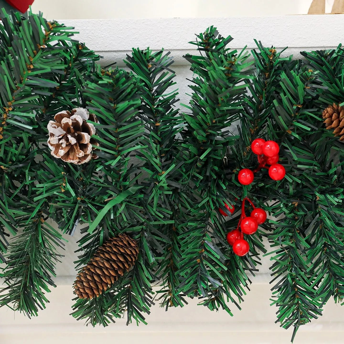 PVC Christmas rattan decorative cane with pine cone bow arrangement in European style design