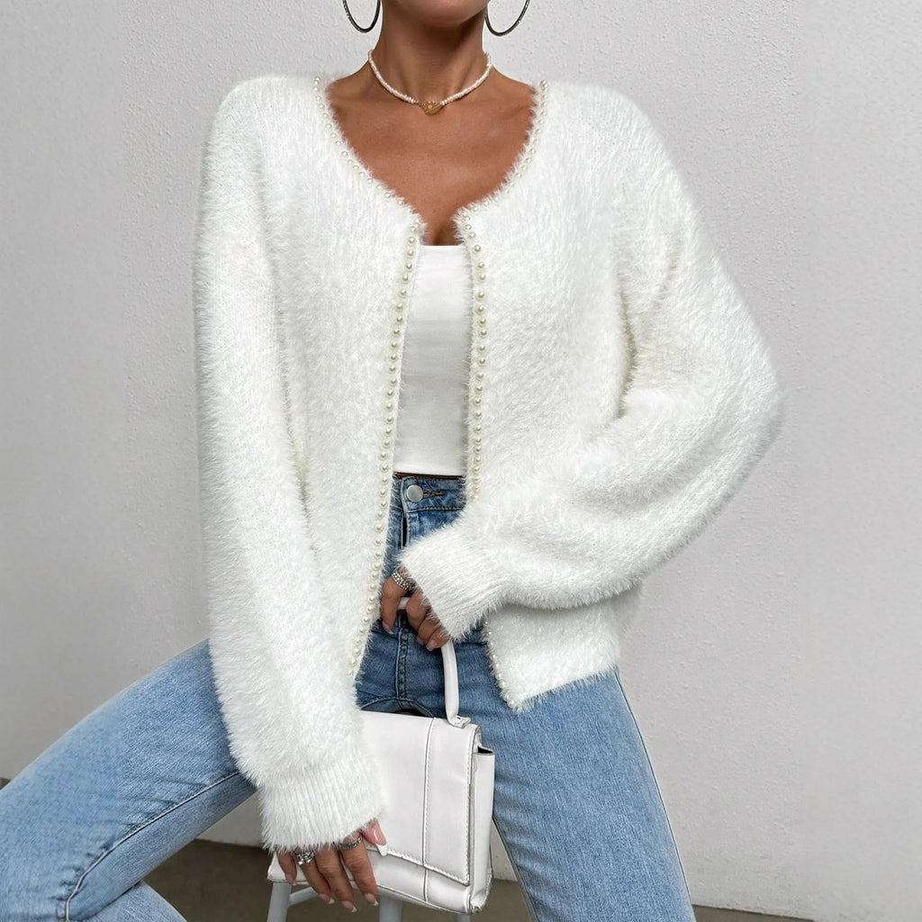 White women's V-neck cardigan with bead knit texture on polyester fabric