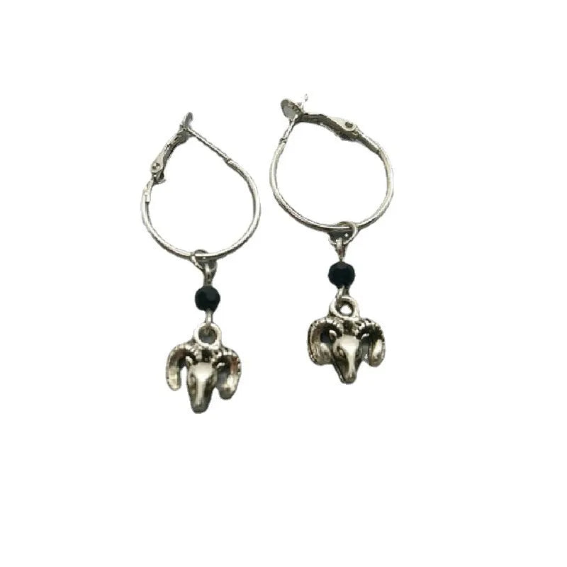 Silver Tibetan antelope round ring earrings for women with Yunnan high altitude inspired design