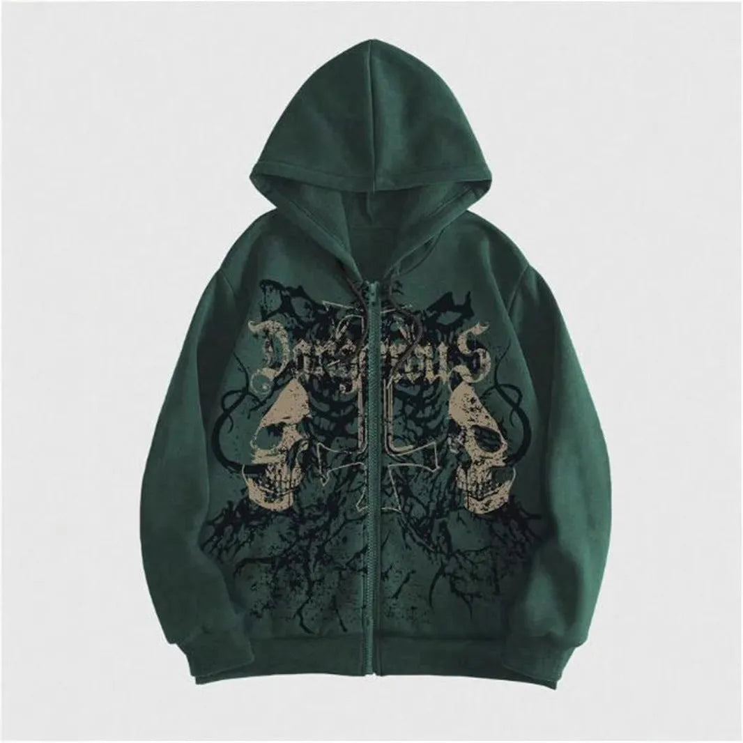 Man wearing a black hooded sweatshirt with a large green skull graphic print on the front.