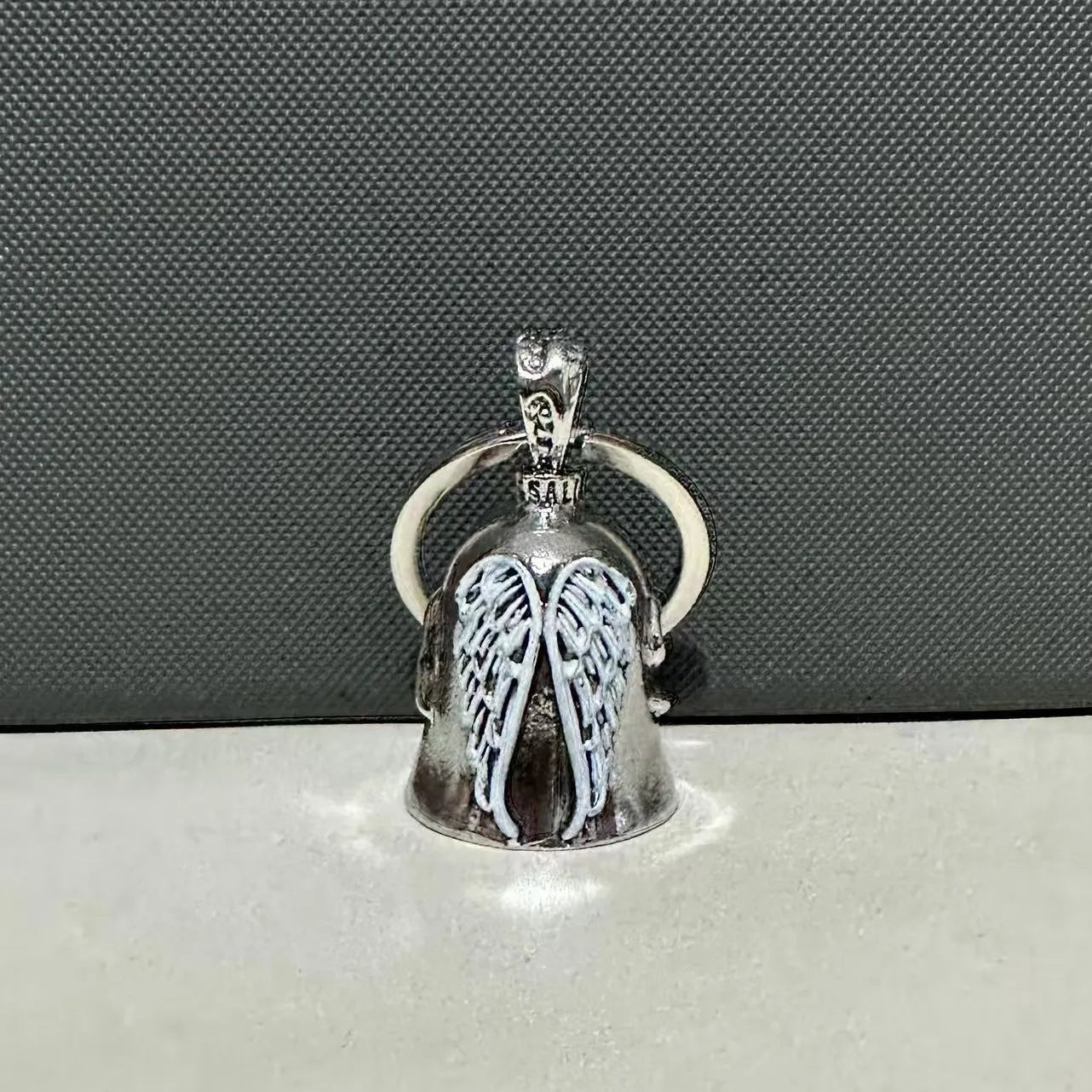 Vintage angel wings necklace and keychain set with silver electroplated finish and feather pendant design