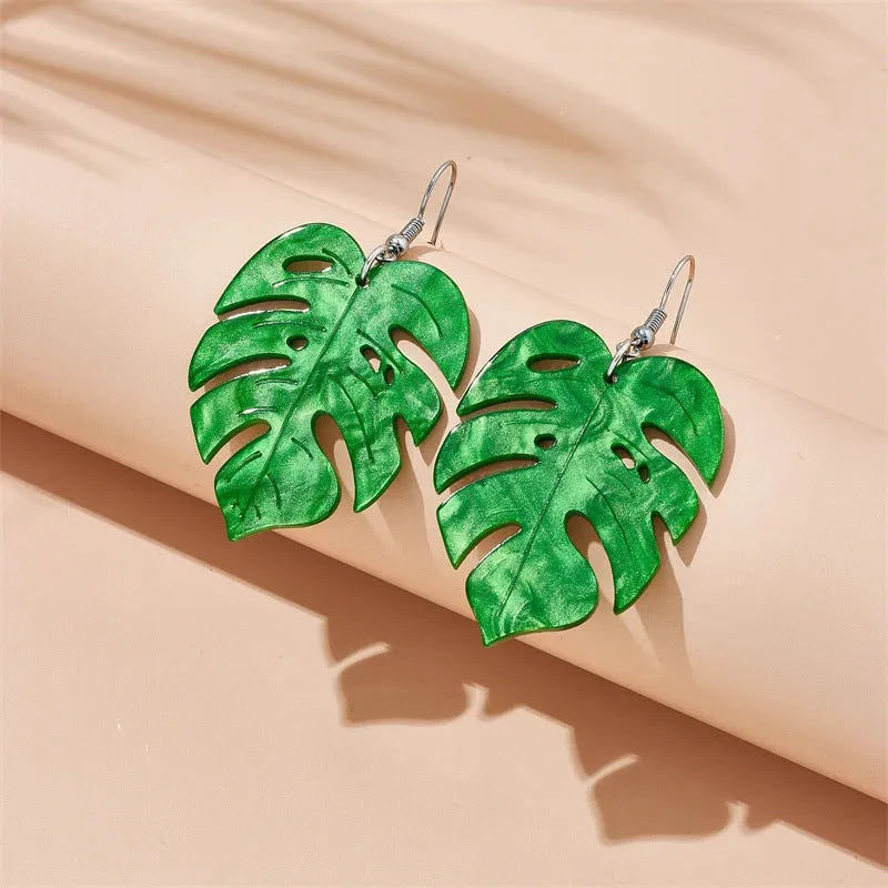 Pair of women's hook earrings with a green and yellow acrylic jackfruit drop decoration on a gold-toned alloy hook.