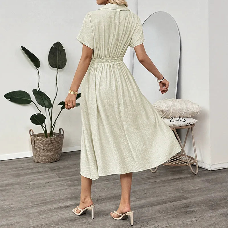 Light green twill shirt dress with lapel, fitted waist and commuter pockets