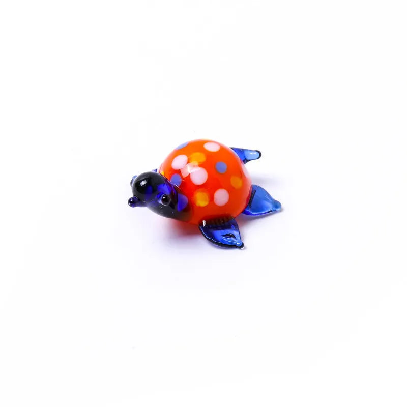 Geometric glass turtle ornament in modern simplicity style for desktop decoration.