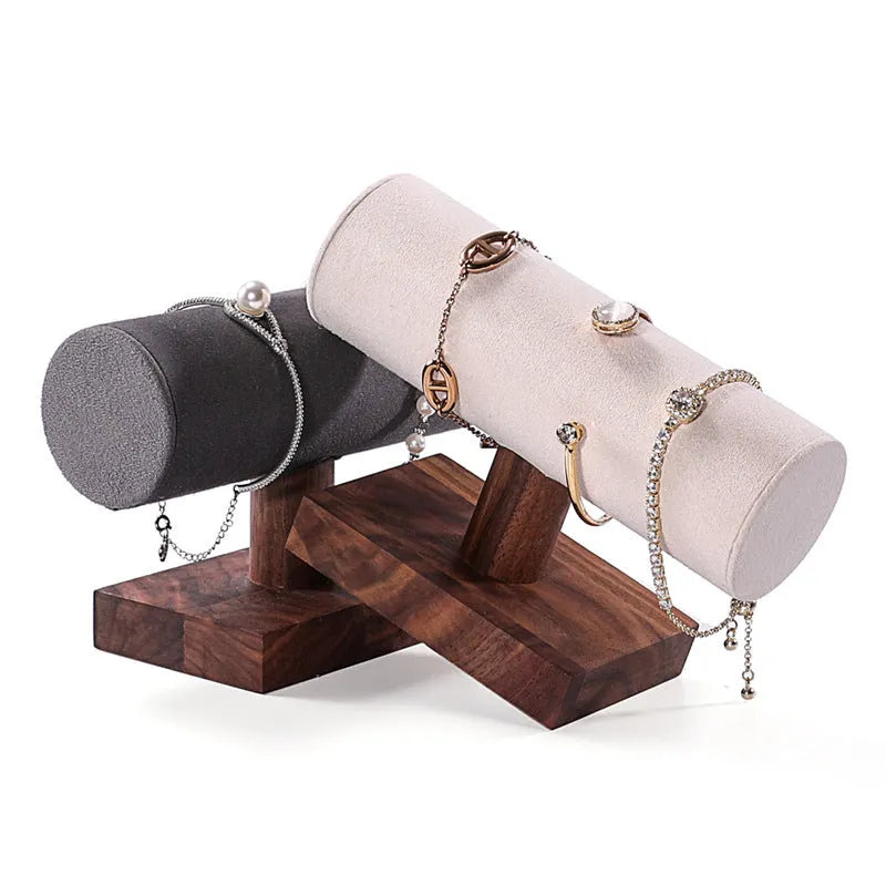 Walnut bracelet display stand with I-shaped solid wood frame and short cylinder, shown in beige velvet, dark grey, or white leather.