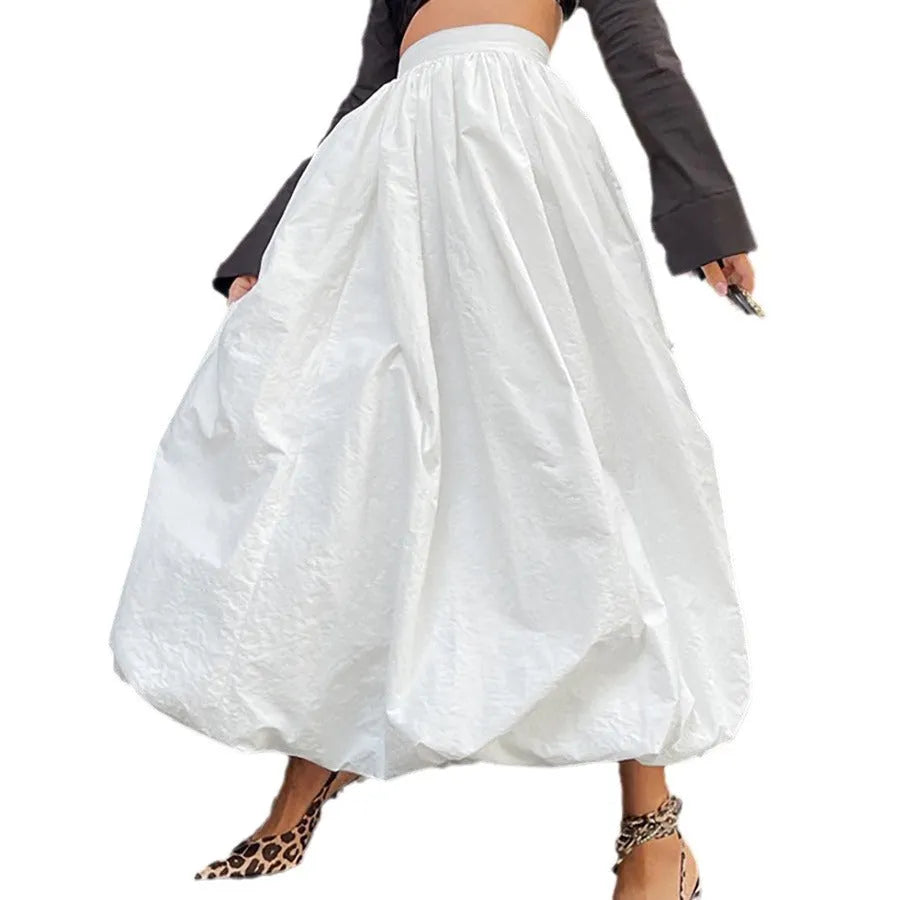 Women's cotton long skirt in solid black colour showing full length design