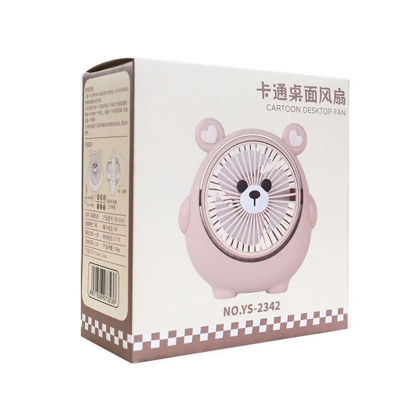 A Bear Brown coloured desktop USB electric fan for dogs on a wooden table.