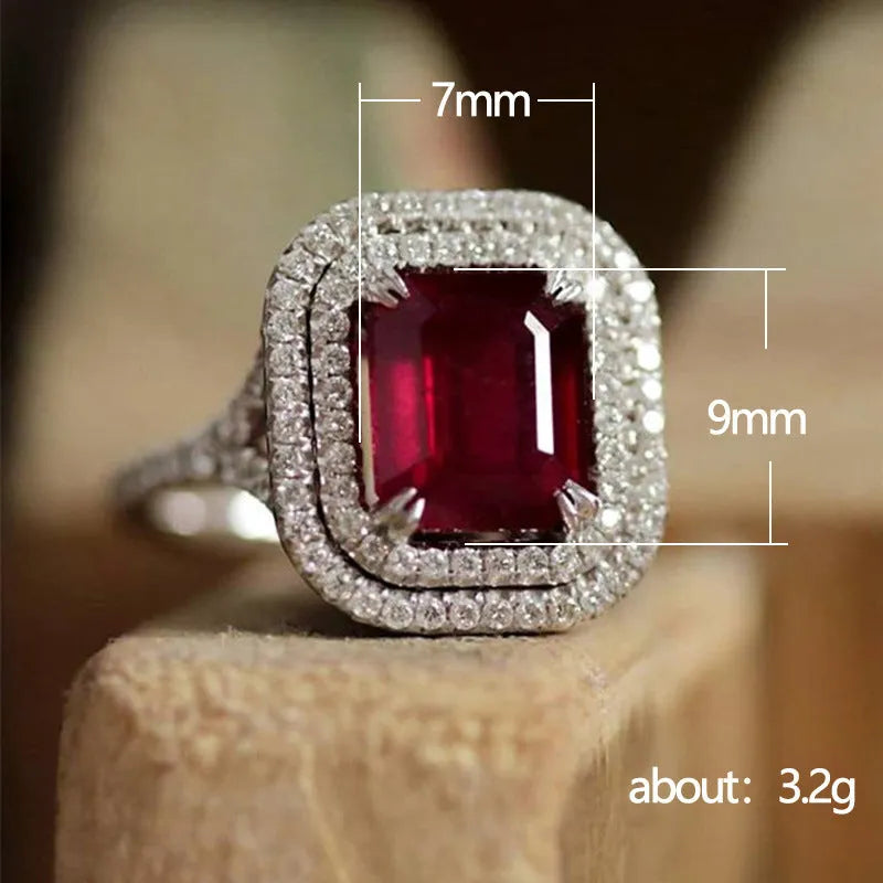 Copper geometric square ring with red rhinestones for women, showing structured design and sparkling accents