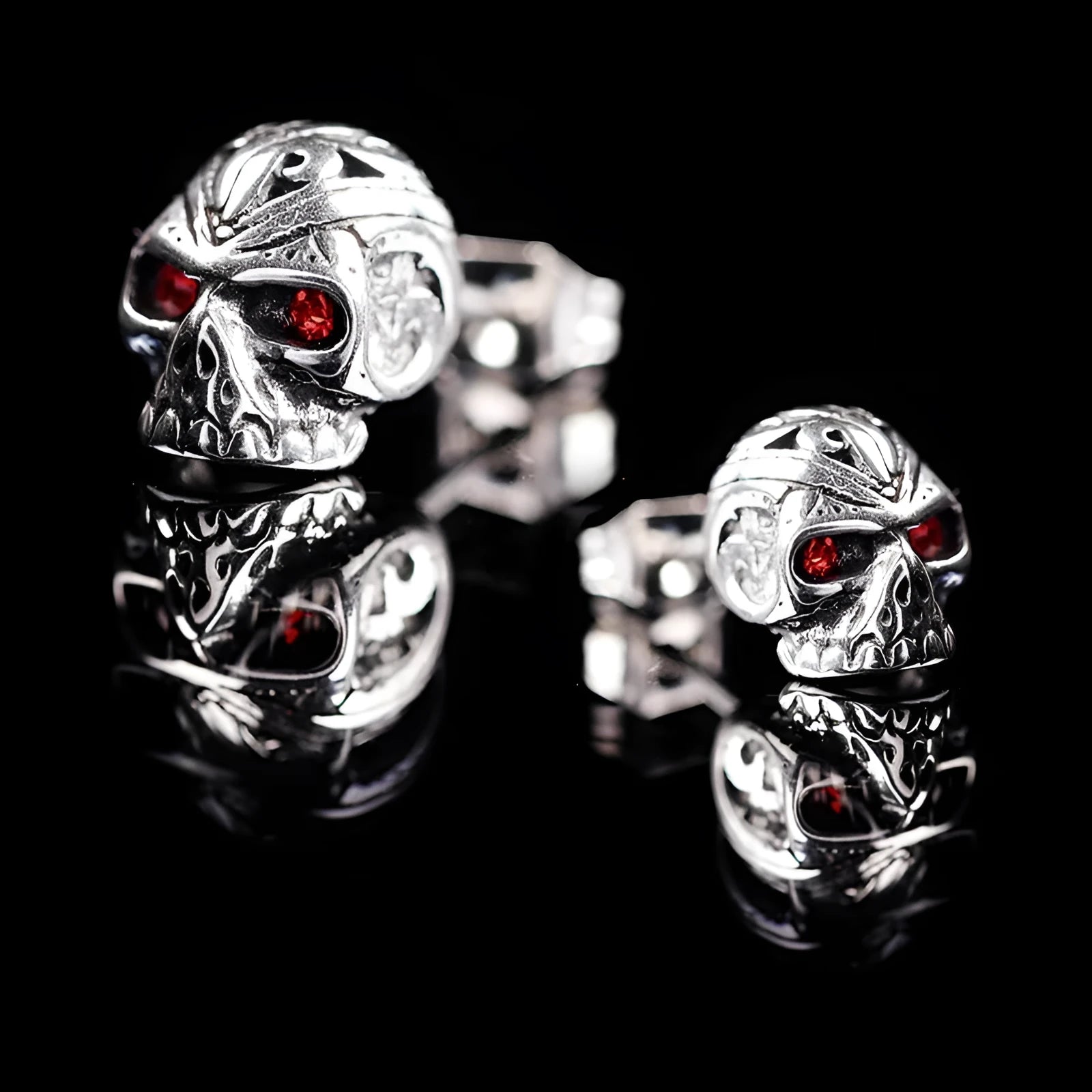 Retro red eye ghost head skull stud earrings with alloy gemstone inlay for women and unisex wear.