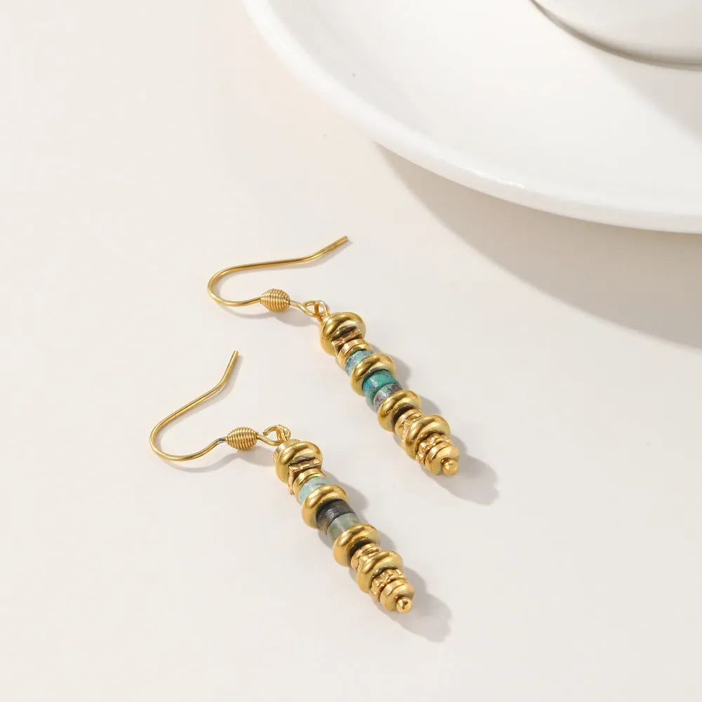 Geometric titanium steel dangle earrings with 18K gold plating, shown in SE22101520 colour.