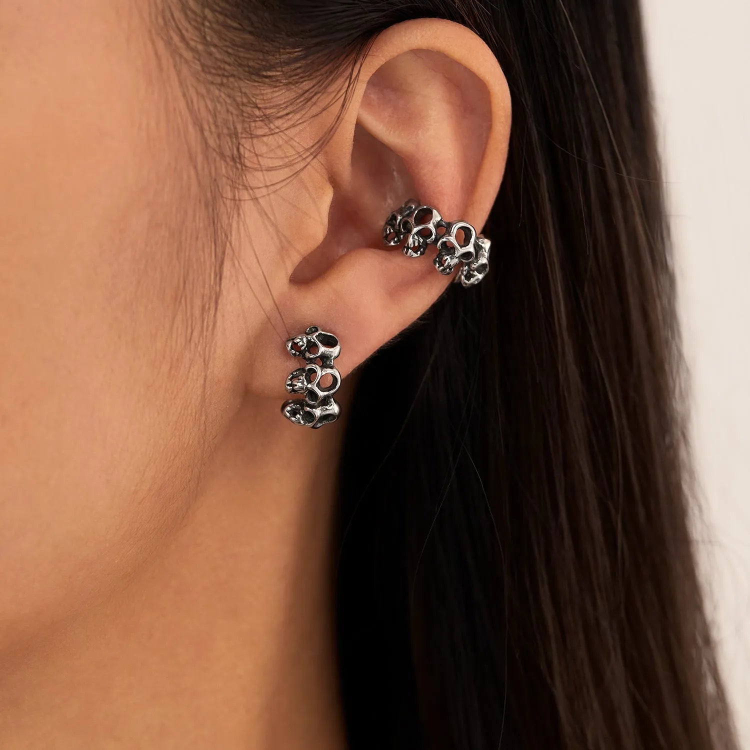 Stainless steel hollow skull ear clips with electroplated finish for men and women