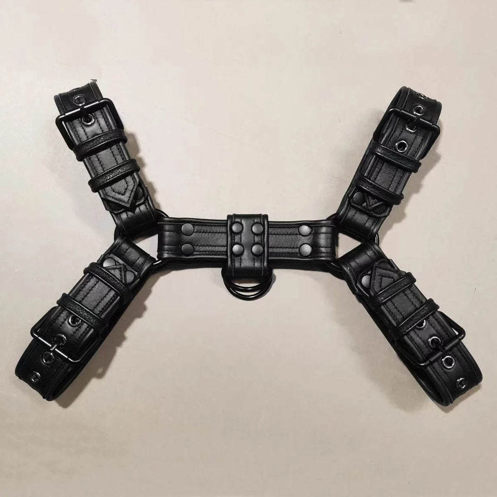 Men's black leather chest strap with metal buckles and rivets