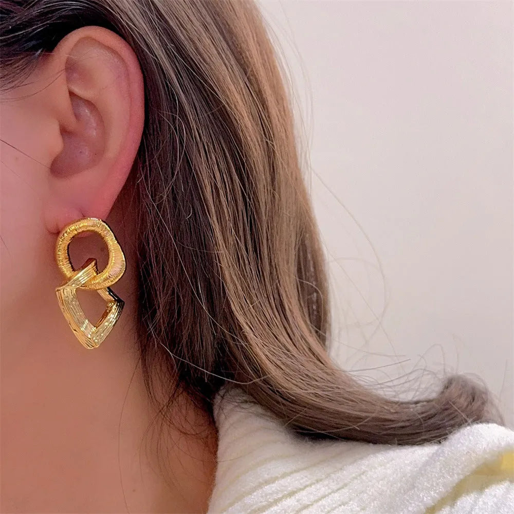 Gold and silver retro geometric copper drop earrings, 3.4cm long.