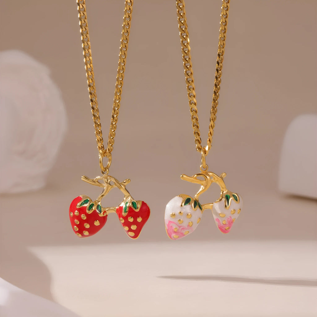 Stainless steel strawberry pendant necklace on adjustable alloy chain in red and white gradient colour options