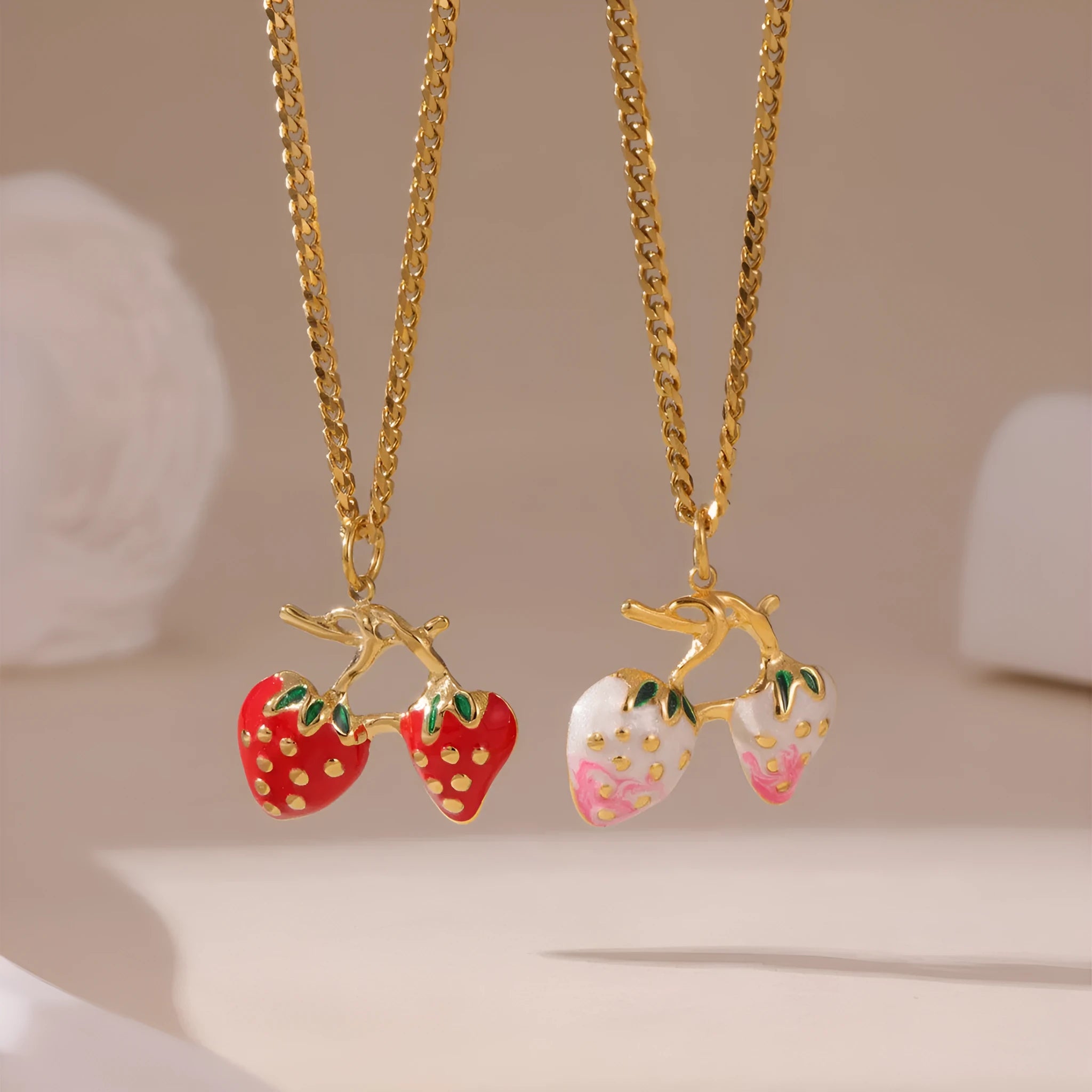 Stainless steel strawberry pendant necklace on adjustable alloy chain in red and white gradient colour options