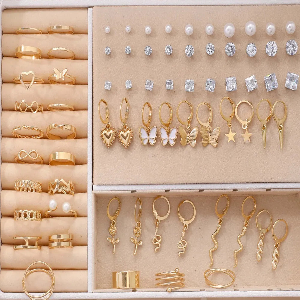 108 geometric pearl earrings with gold and yellow electroplated finishes on alloy construction