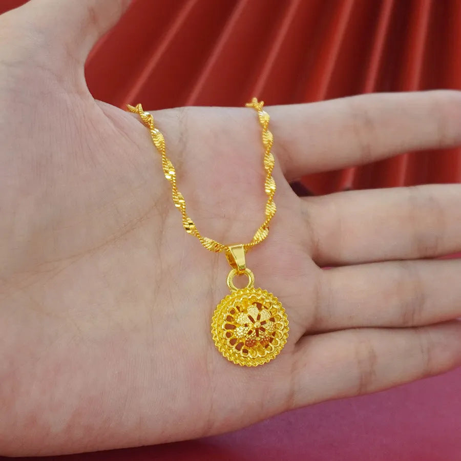Landscape Middle East gold-plated floral jewellery set showing necklace, earrings and ring with electroplated finish
