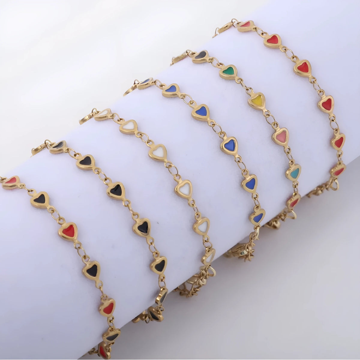 Stainless steel heart bracelet with 18K gold plating in black, white, blue, red colours