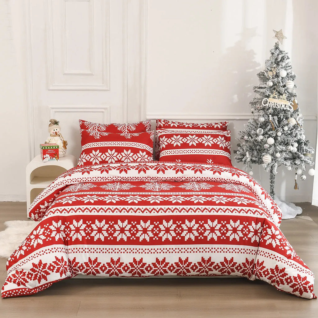 Red Christmas pattern three-piece bedding set with quilt cover and pillowcases on bed