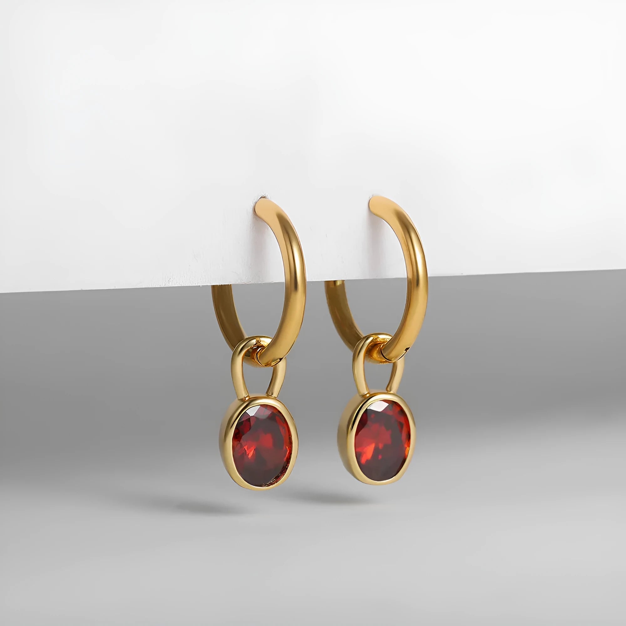 Women's retro oval zircon earrings in copper metal with ellipse design, shown in multiple colour options