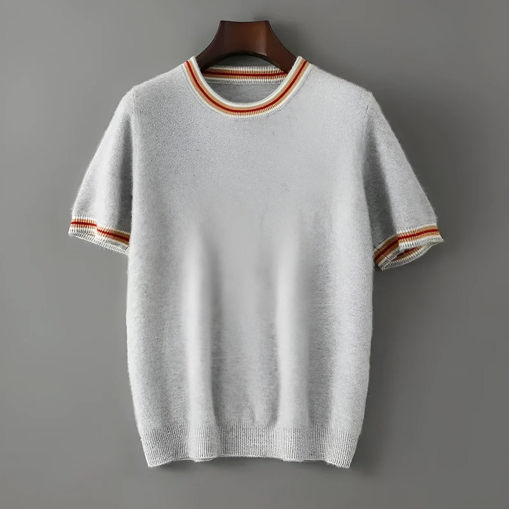Men's short sleeve pure wool sweater in grey, showing round neck and pullover style on a middle-aged model.