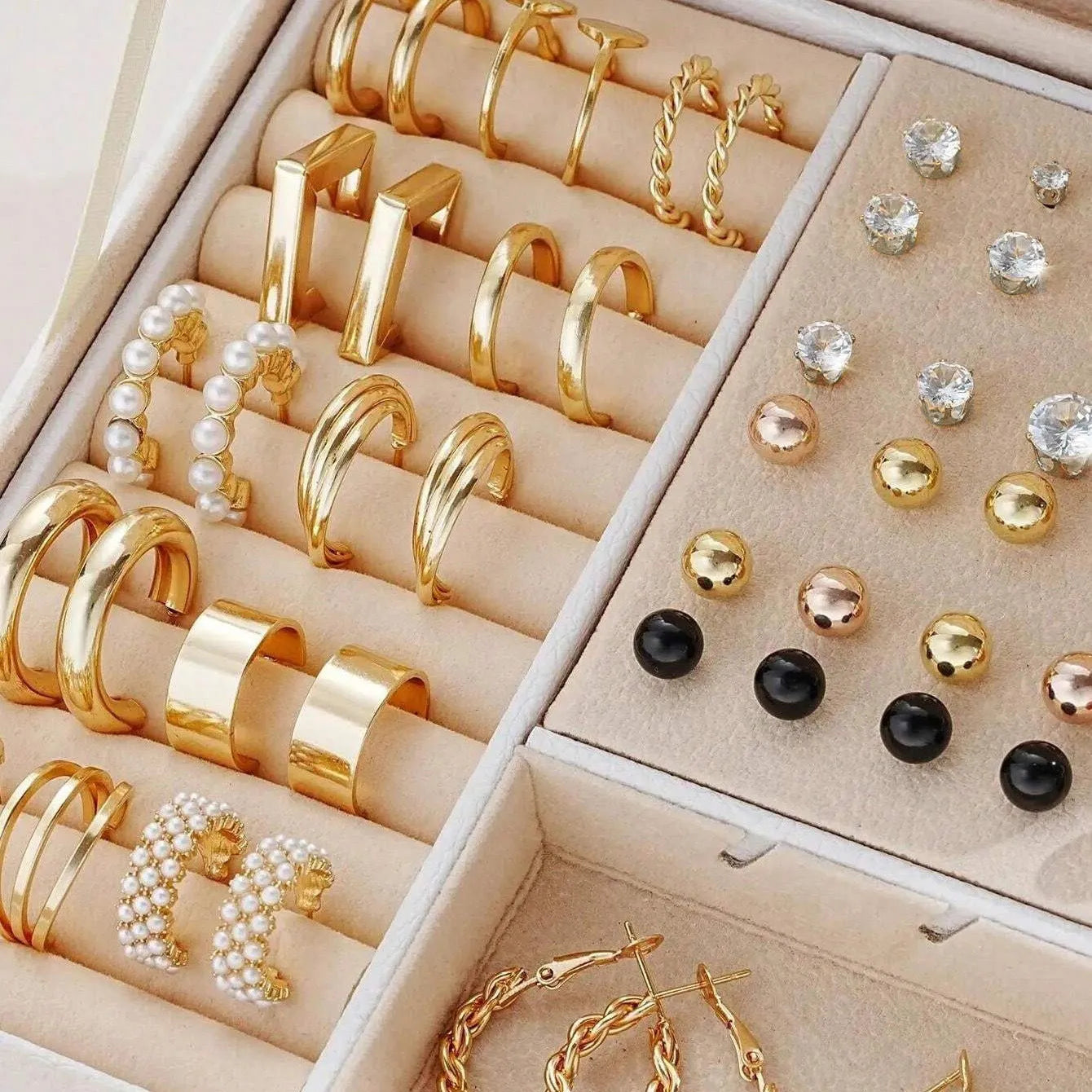 108 geometric pearl earrings with gold and yellow electroplated finishes on alloy construction