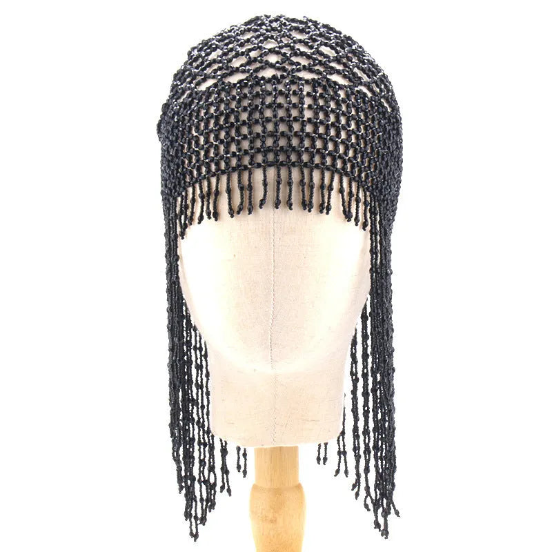 Handmade alloy belly dance hat with tassels and decorative mesh panels.