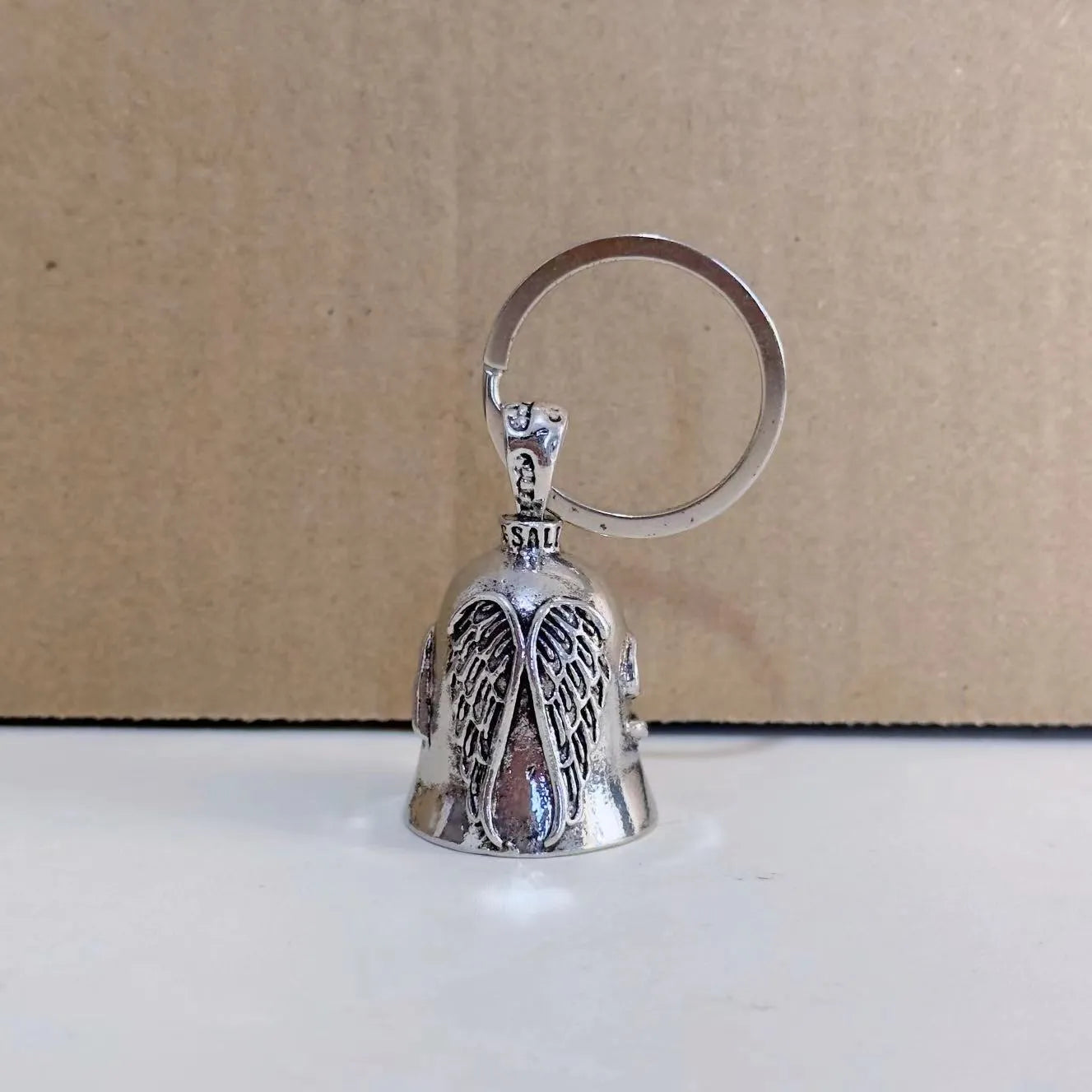 Vintage angel wings necklace and keychain set with silver electroplated finish and feather pendant design
