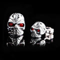 Retro red eye ghost head skull stud earrings with alloy gemstone inlay for women and unisex wear.