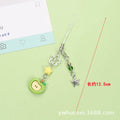 Cute fruit design plastic phone charm keychain on a white or silver rope.
