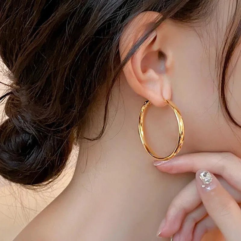 Gold and silver 40mm diameter electroplated copper circle earrings