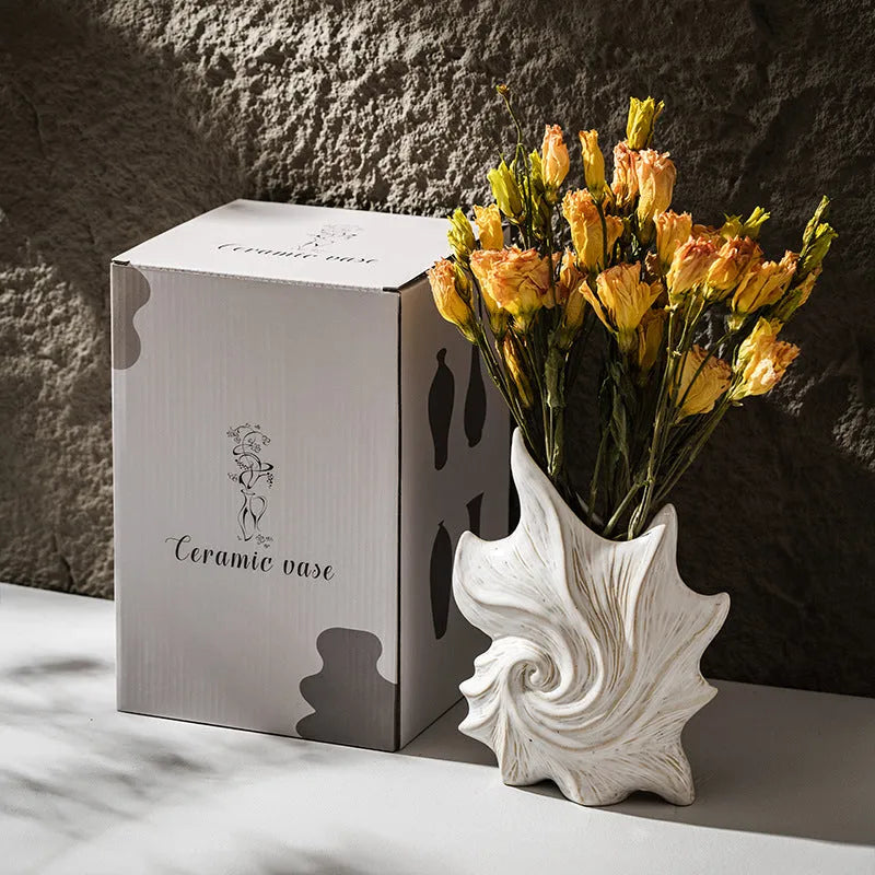 European retro style ceramic vase with a coloured glaze finish on a wooden table.