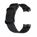 Nylon three-ring buckle replacement strap for Fitbit Charge fitness trackers in army green colour.